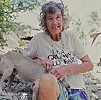 Erlene Downie and her Dog.jpg - Erlene removing ticks from her dog