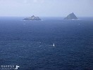 Sailing By.jpg - Difficult to imagine that two inhospitable rocks rising steeply out of the ocean could be so steeped in history and be home to such abundant wildlife.